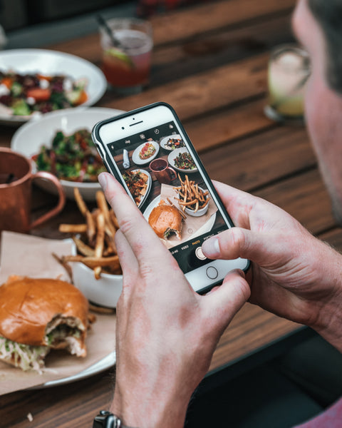 Customer Taking Photo of Food - Why Food and Restaurant Businesses Need Marketing